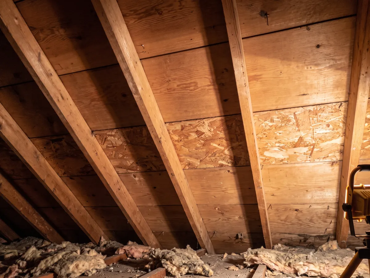 After mold remediation in Gettysburg, PA: the same attic sheathing and rafters cleaned back to bare wood